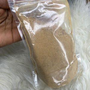 Soumbala en poudre de qualité, condiment africain traditionnel à base de néré fermenté, idéal pour assaisonner sauces et plats africains, disponible en ligne sur DEBI STORE